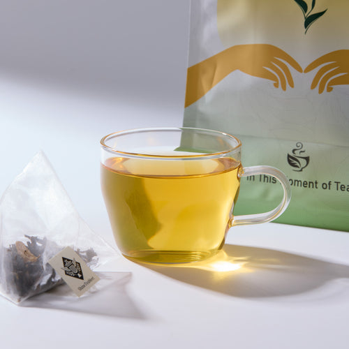 White Peach Oolong Tea served with premium tea packaging